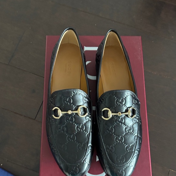 Gucci Shoes - Gucci Black GG embossed Leather Loafers